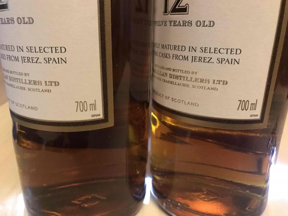 前酒标：旗舰店是金色细字体，酒虫网是金色粗字体