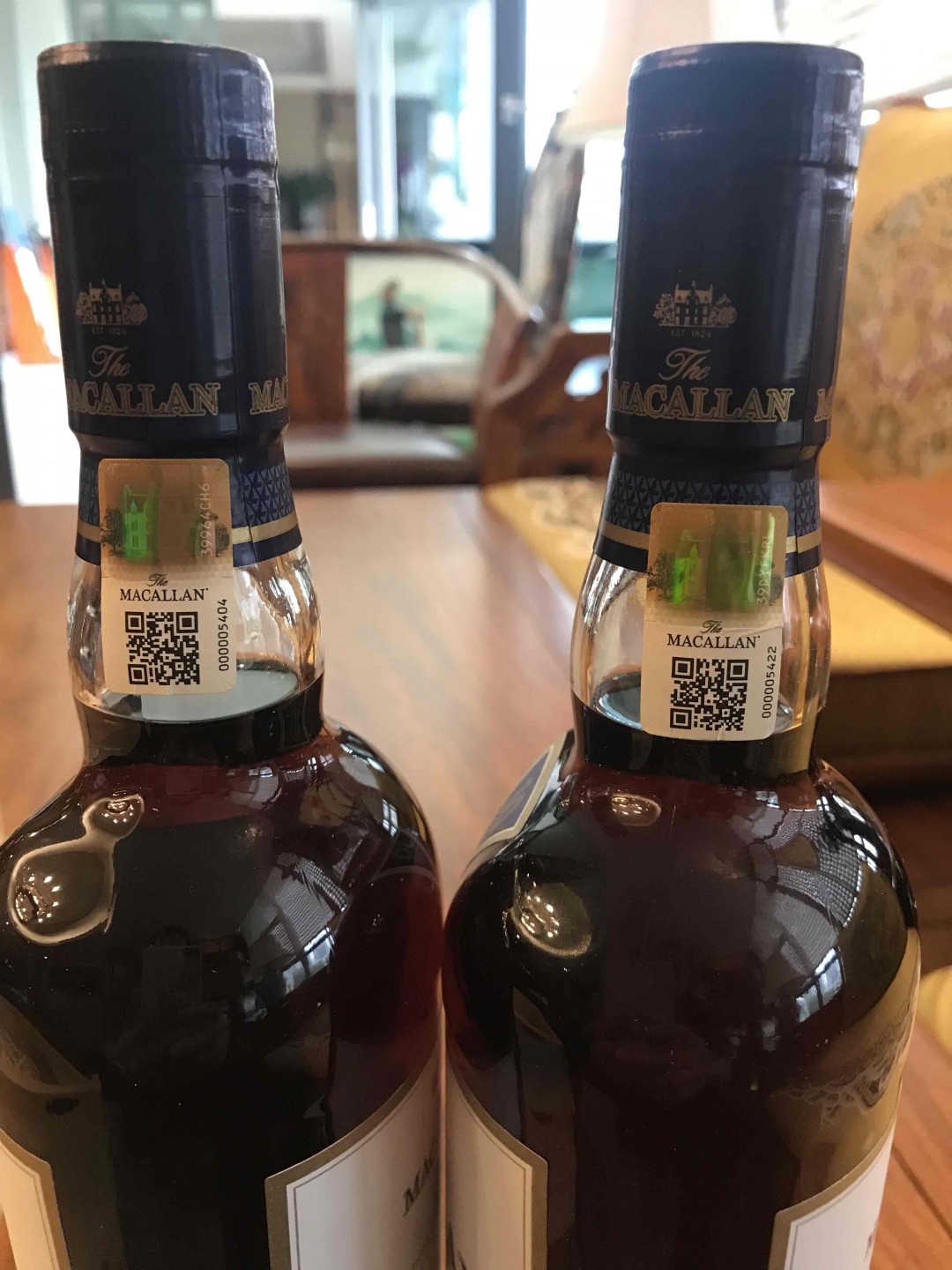 这样评论这两瓶酒有问题？？有懂行的大神发表下建议