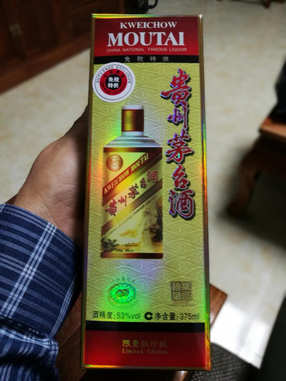 在新加坡机场免税背的