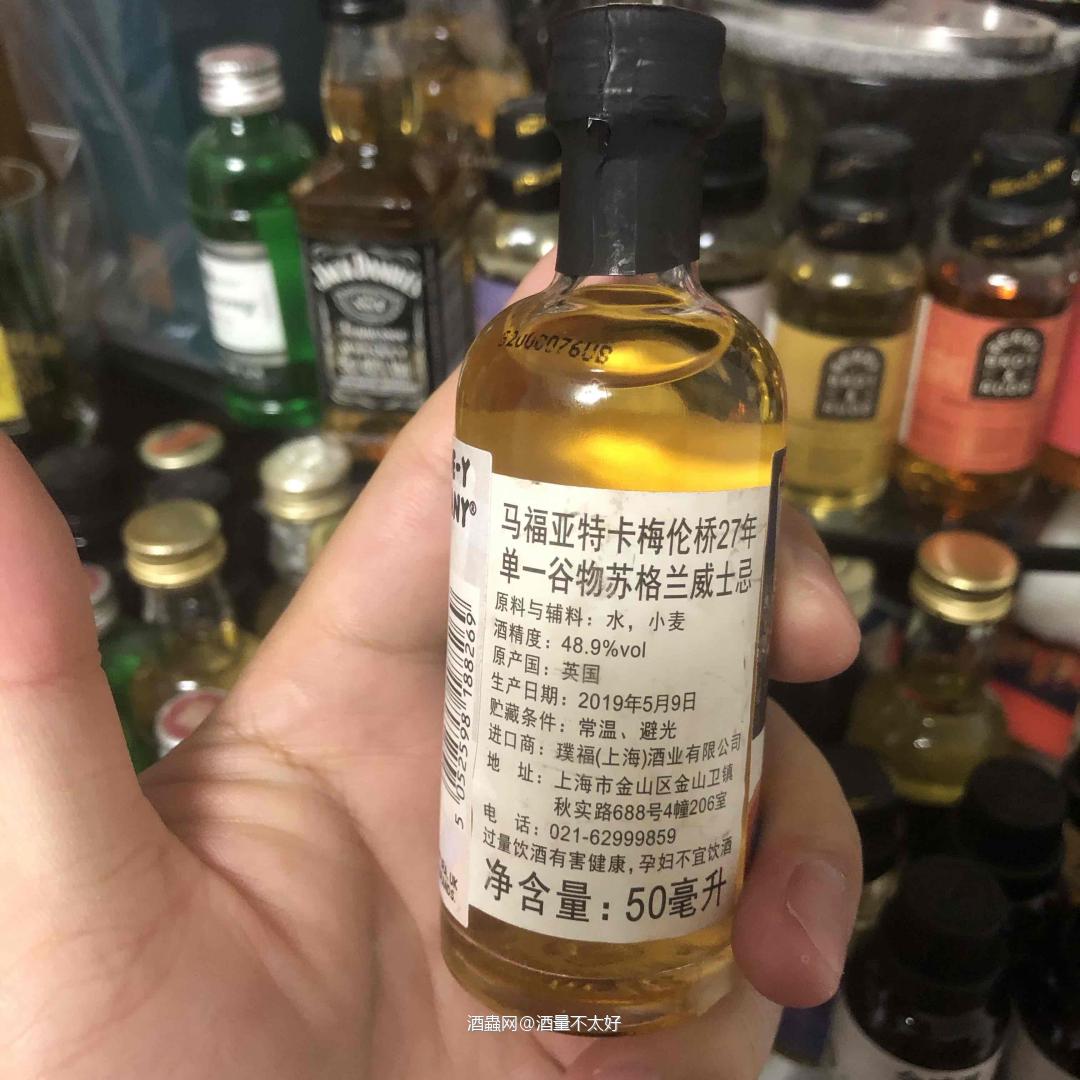 27年的谷物威士忌，可爱的漫画酒标。
