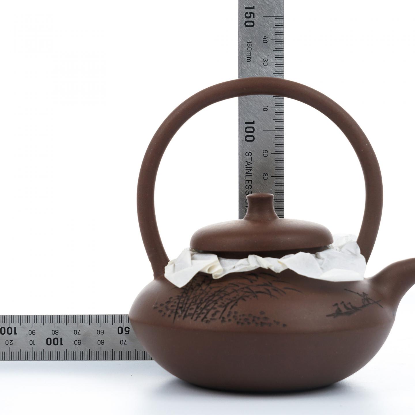 （长乐弘）【徐秀棠题字】合欢提梁壶 紫砂壶 当代 约250cc 约高73mm