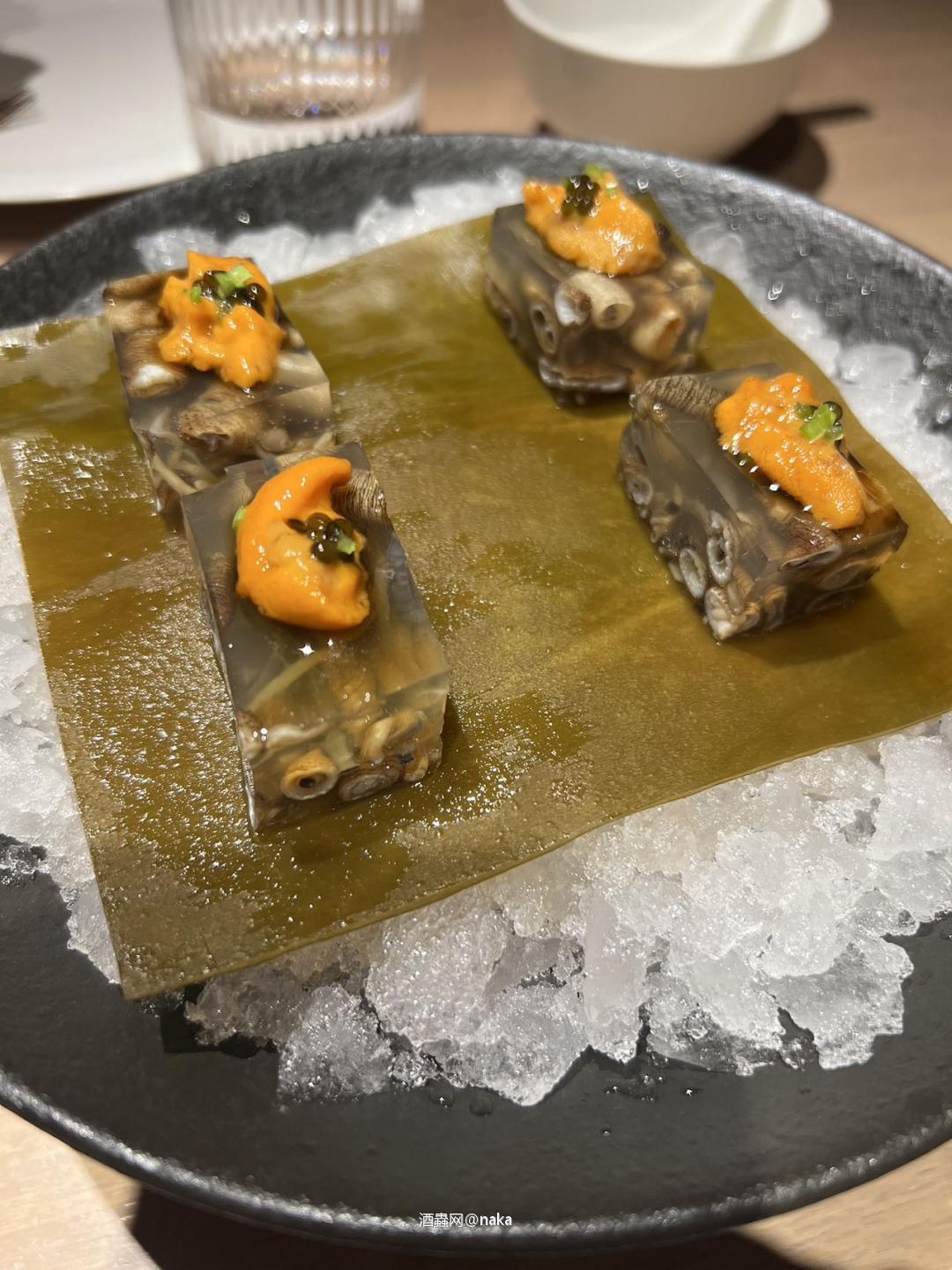 在酒虫网上买的白雪香槟配黑珍珠福建菜